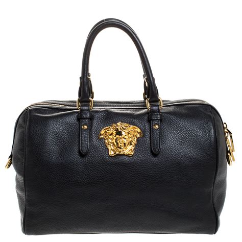 versace pocketbooks|Versace collection leather bag.